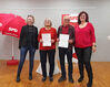 Elke Berger (li.) und Ingela Freisler (re.) ehren Ute Schipporeit und Gerd Stahuber für 40jährige Mitgliedschaft